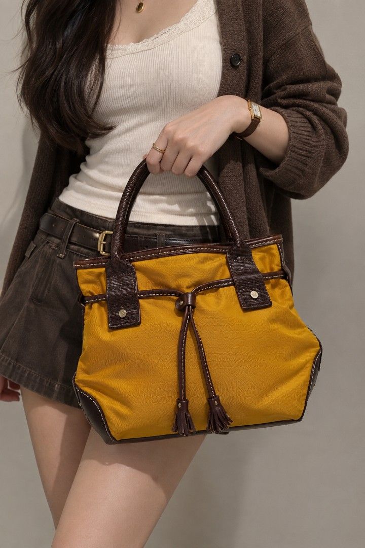 Lancel Bucket Fabric Bag (Category: Luxury Bags & Wallets) located in Baguio. Submitted by PreiLoveMaria (Listing ID 1338093455, Image 1). Description: Lancel Bucket Fabric Bag Lightly Used Length: 28 cm Width: 10 cm Height: 26 cm Handle Drop:10 cm Hardware: Silver Tone Exterior Material: Leather, Nylon Kindly check the Detailed photos Shipping via J&T only No COD and COP ❤️ Item is from Japan and US Surplus.
