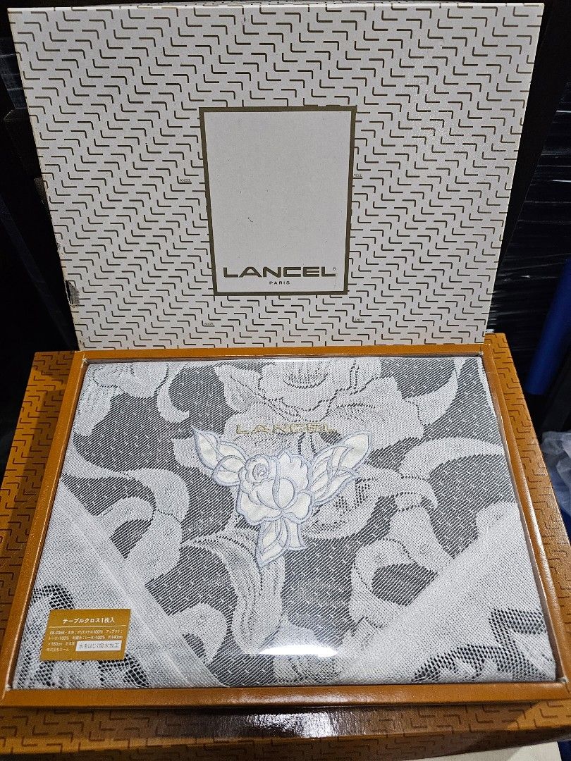 SALE❗LANCEL Table Cloth - Pure Lace (Category: Table Linen & Textiles) located in Quezon City. Submitted by senyoramaria (Listing ID 1461980563, Image 1). Description: LANCEL Table Cloth 100% Polyester Pure Lace Clean, no issue. 140 x 180 cm Note: White ung lace, color black ung ginamit na card board as background para makita ung design. Php1000❗.