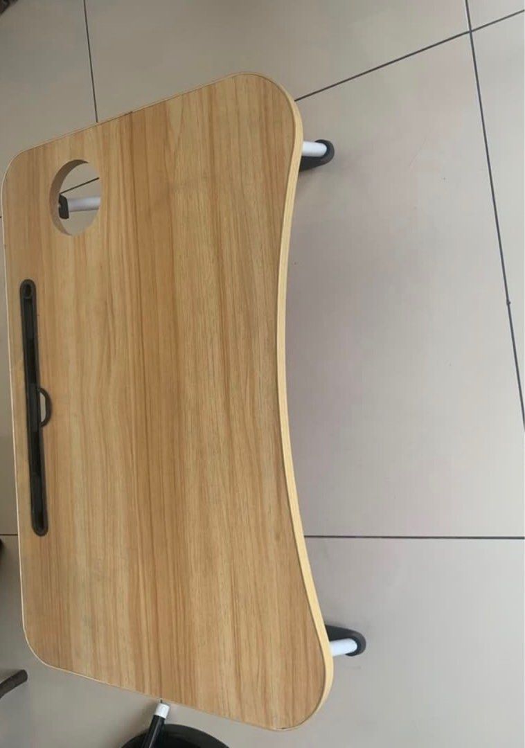 laptop desk / bed table (Category: Cases & Sleeves) located in Manila. Submitted by decluterthings888 (Listing ID 1461976578, Image 1). Description: .