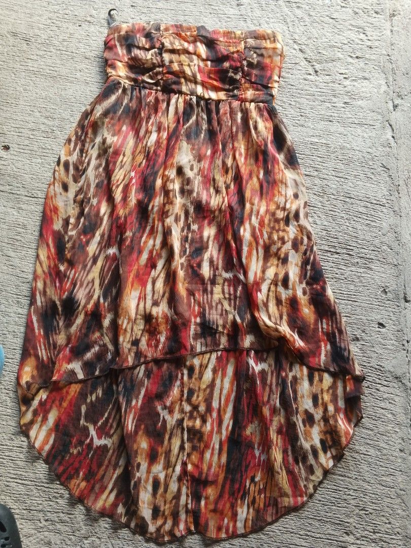Y2K Le Chateau Strapless Hi-Low Dress (Category: Dresses) located in Manila. Submitted by icamalicdem29 (Listing ID 1461899090, Image 1). Description: - Strapless design - Ruched bust detail - Bold animal print (brown, red, tan) - High-low hemline (shorter in front, longer in back) - Lightweight fabric - Ideal for a night out.