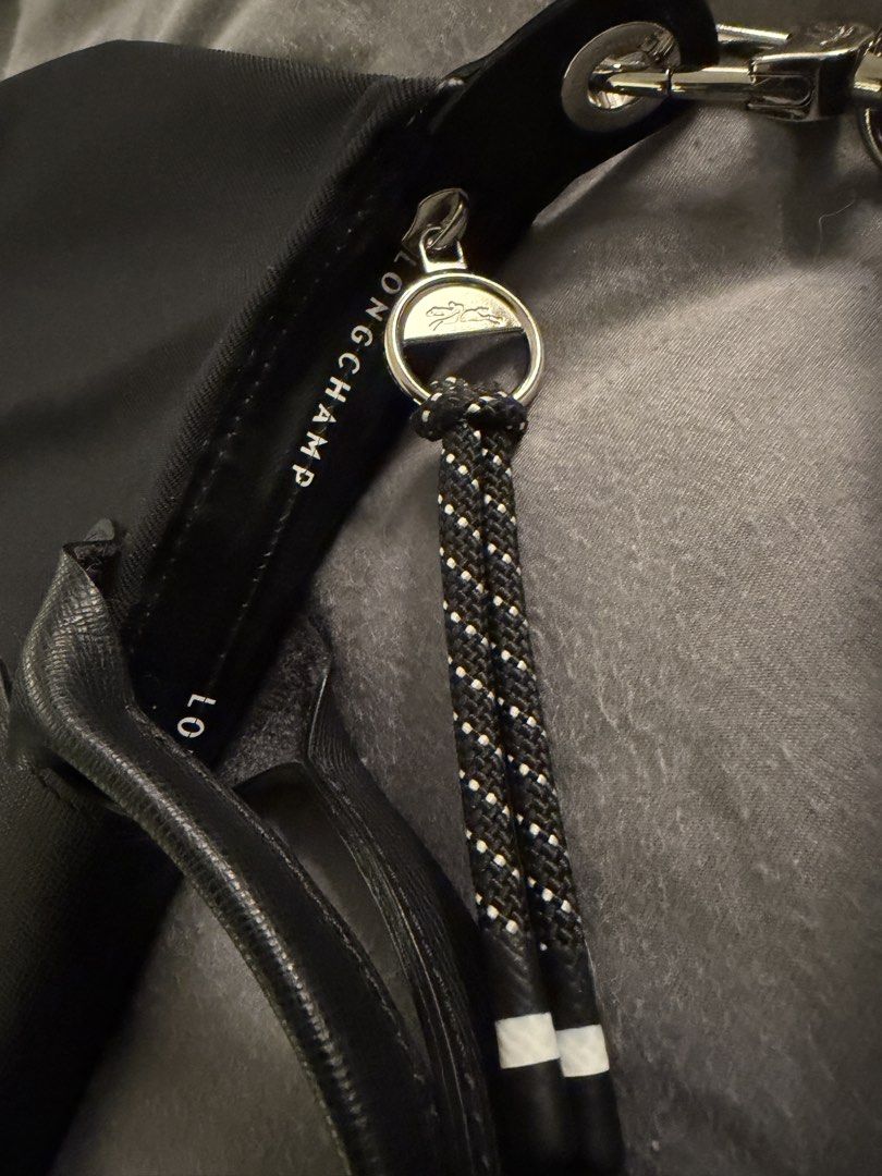 Le Pliage Energy Top Handle Bag S Black (Category: Luxury Bags & Wallets) located in Manila. Submitted by booksretold (Listing ID 1461834536, Image 3). Description: Soft and lightweight, this small Longchamp Le Pliage Energy Top Handle Bag is ideal for carrying all of your essentials. Combining femininity and clean minimal lines, this is an essential everyday accessory. In this durable urban version that respects natural resources, Le Pliage Ener