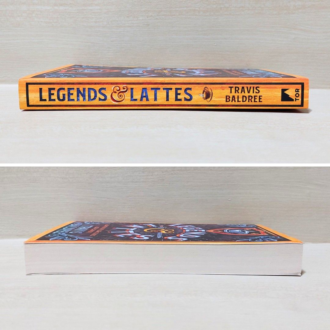 Legends & Lattes by Travis Baldree (Category: Storybooks) located in San Pedro. Submitted by hydeist (Listing ID 1461857859, Image 3). Description: - used trade paperback in very good condition - authentic copy bought in the UK - 'Legends & Lattes' by Travis Baldree - Features an orc barbarian who retires her sword to open a coffee shop. - Genre: High fantasy, low stakes, cozy read. - Perfect for fans of coffee and fantasy. - Promises good compan