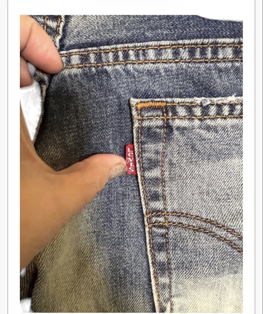 Unique Levi's Jeans Distressed Blue Wash (Category: Jeans) located in Quezon City. Submitted by letsdeclutter101 (Listing ID 1461980117, Image 3). Description: - Classic Levi's 501 jeans - Blue wash with a distressed look - Straight leg fit - Button fly closure - Great for everyday wear - Pre-loved, still has plenty of life left - Please check photos for exact condition.