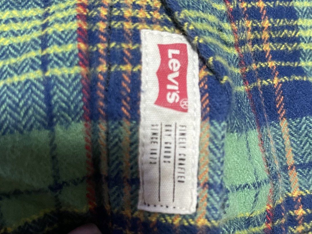 Levi's Patchwork Flannel Denim Shirt Size M (Category: Babies & Kids Fashion) located in Manila. Submitted by rayuki39 (Listing ID 1461913647, Image 3). Description: - Authentic Levi's shirt with a unique patchwork design. - Combines red plaid, green plaid, and classic denim fabric. - Denim collar and sleeves for a stylish look. - Tag size: M (150/72). - Material: 100% Cotton shell fabric. - Origin: Made in China..