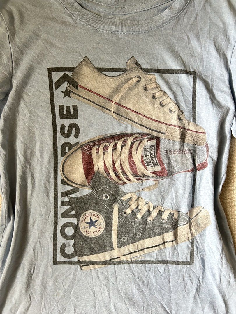 Light Blue Converse Shirt (Category: Shirts) located in Quezon City. Submitted by y2klar (Listing ID 1461984759, Image 2). Description: Light Blue converse shirt Size-Small-Medium L-23 Width-16 9/10 Condition (check small flaws in end).