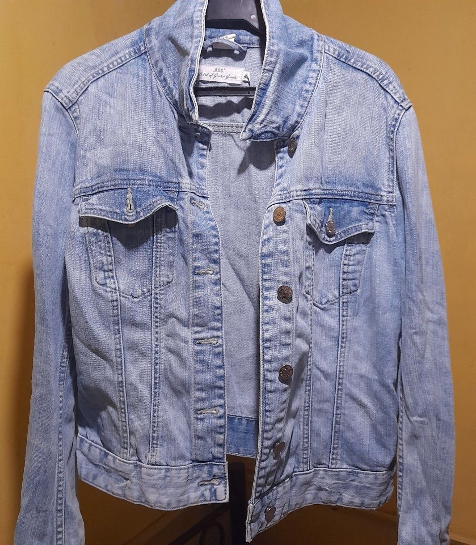 L.O.G.G. Denim Jacket (Category: Coats, Jackets and Outerwear) located in Pasig City. Submitted by chesca_closet (Listing ID 1461949615, Image 1). Description: - Light wash denim jacket - Brand: L.O.G.G. (Label of Graded Goods) - Classic trucker style - Button closure - Chest pockets - Estimated size: 10 - Ideal for layering - Versatile wardrobe staple.