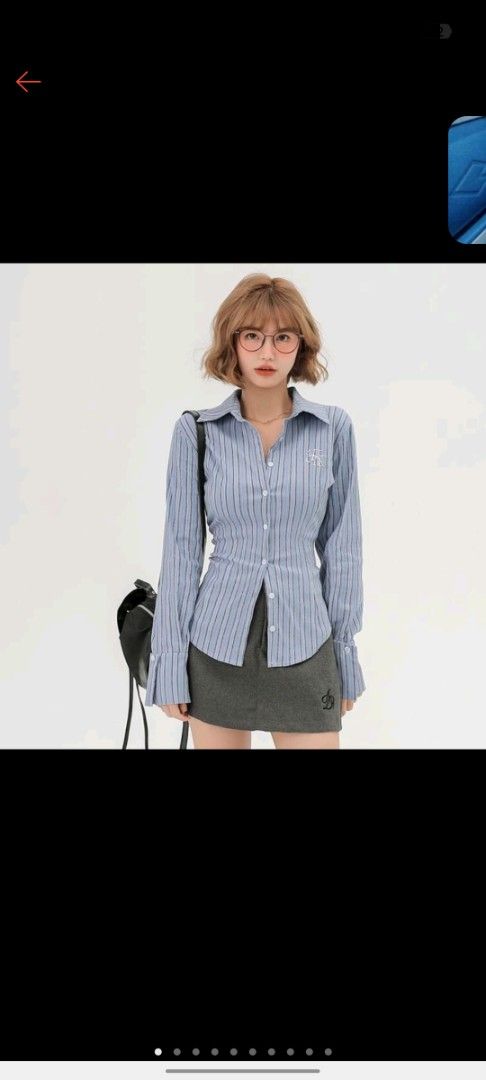 Long sleeve college type shirt (Category: Longsleeves) located in Manila. Submitted by merishaylll (Listing ID 1461948327, Image 1). Description: - Light blue and white striped long-sleeve shirt - Button-up front with a classic collar - Small embroidered detail on the chest - Fitted silhouette for a modern look - Sleeve cuffs for a polished finish - Perfect for both casual and smart outfits.
