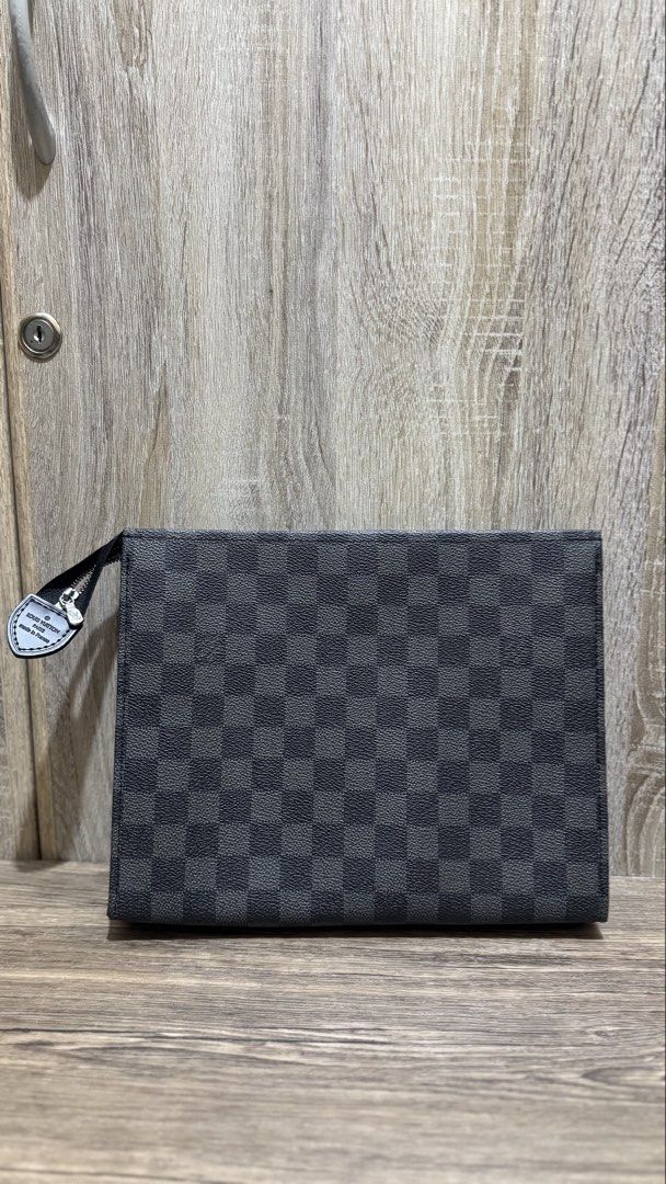 Louis Vuitton Damier Graphite Canvass Pouch (Category: Luxury Bags & Wallets) located in Taguig. Submitted by soranghae.co (Listing ID 1461837301, Image 3). Description: Guaranteed Japan Sourced Japan Preloved no flaws/issues .