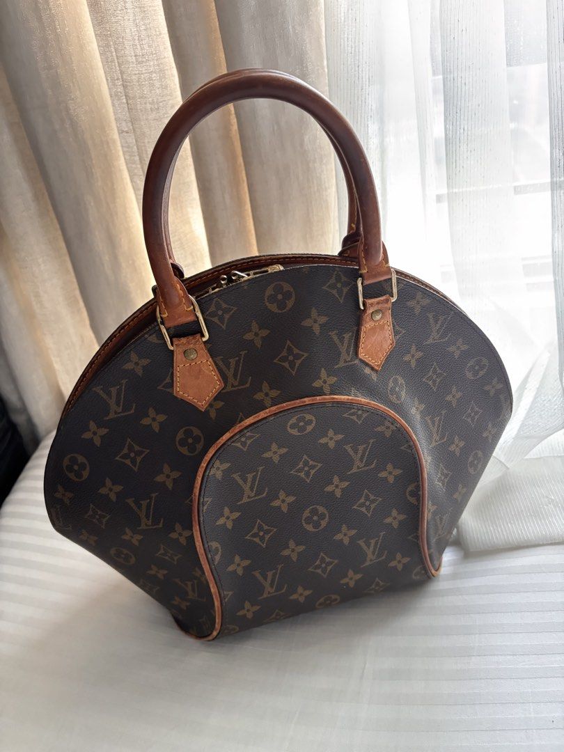 Louis Vuitton Ellipse MM (Category: Luxury Bags & Wallets) located in Pasig City. Submitted by patsales_ (Listing ID 1461800594, Image 1). Description: Material: Monogram coated canvas + natural vachetta leather Style: Vintage top-handle / bowling-style bag Typical dimensions: around 15–16” wide × 12” Authentic Rfs: decluttering . Not used often.