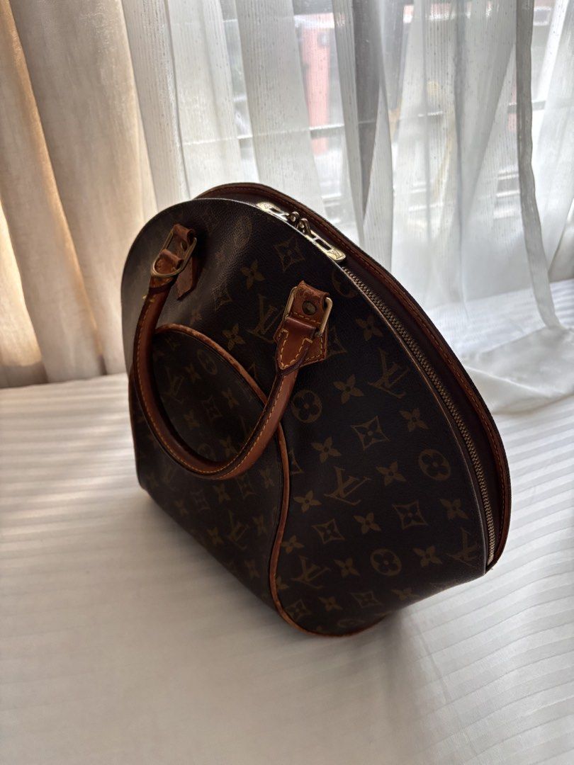 Louis Vuitton Ellipse MM (Category: Luxury Bags & Wallets) located in Pasig City. Submitted by patsales_ (Listing ID 1461800594, Image 2). Description: Material: Monogram coated canvas + natural vachetta leather Style: Vintage top-handle / bowling-style bag Typical dimensions: around 15–16” wide × 12” Authentic Rfs: decluttering . Not used often.