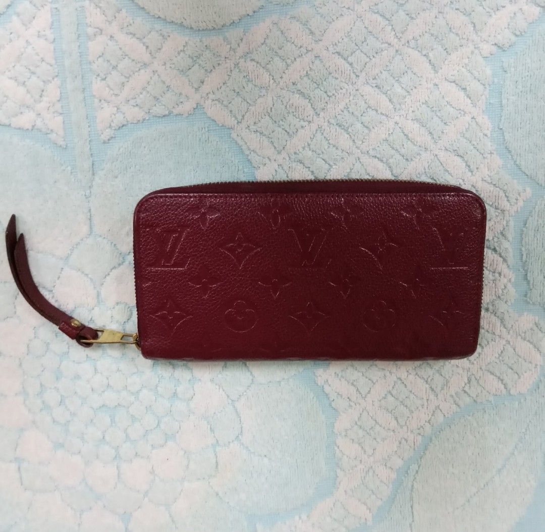 Louis Vuitton Empreinte Long Zipper Wallet (Category: Luxury Bags & Wallets) located in Taguig. Submitted by esa.agustin (Listing ID 1461805368, Image 2). Description: Original Louis Vuitton Empreinte Burgundy long zipper wallet. Made in France.