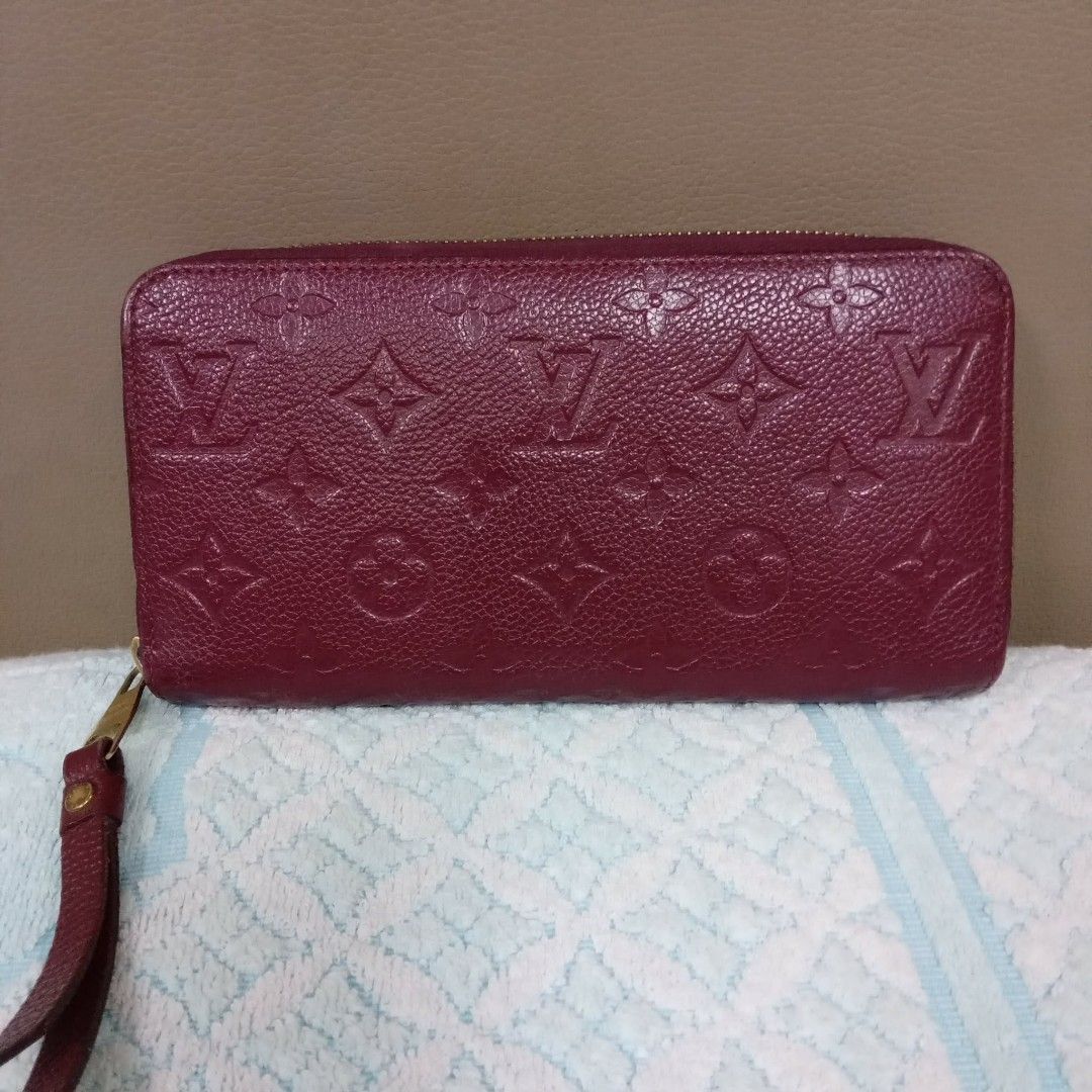 Louis Vuitton Empreinte Long Zipper Wallet (Category: Luxury Bags & Wallets) located in Taguig. Submitted by esa.agustin (Listing ID 1461805368, Image 1). Description: Original Louis Vuitton Empreinte Burgundy long zipper wallet. Made in France.