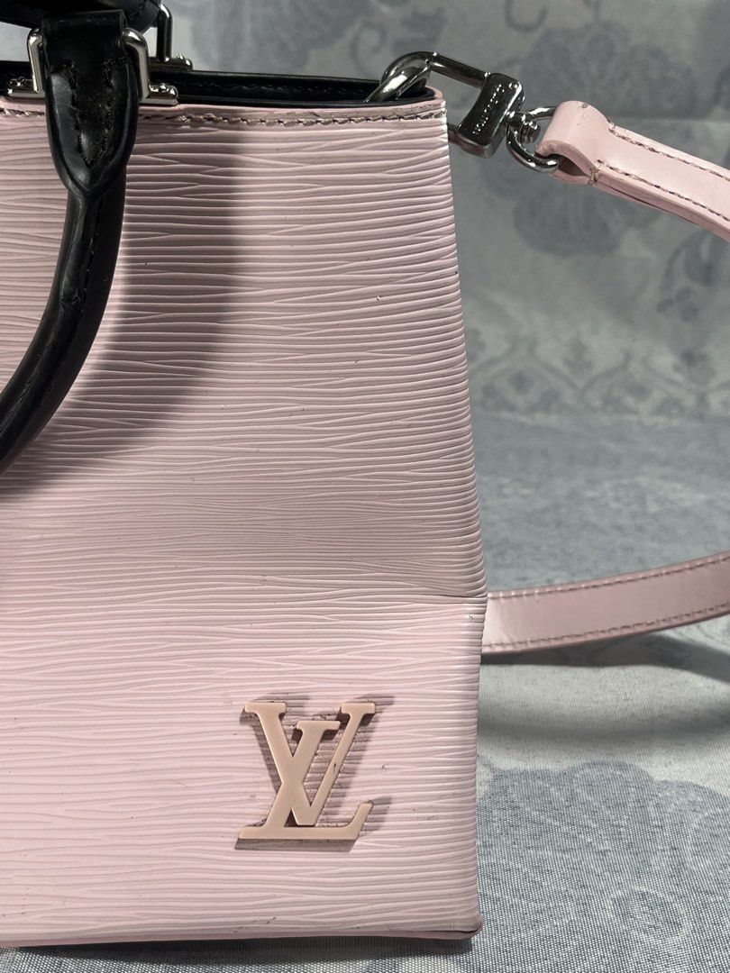 Louis Vuitton Epi Leather Pink Top Handle Bag (Category: Luxury Bags & Wallets) located in General Santos City (Dadiangas). Submitted by maisonmargiela2004 (Listing ID 1461988618, Image 3). Description: - Authentic Pink Louis Vuitton Bag - Epi Leather Texture - Detachable Shoulder Strap Included - Black Top Handles - Interior Zipper Pocket - Silver-Toned Hardware - Made in France - Clean Inside and Out.