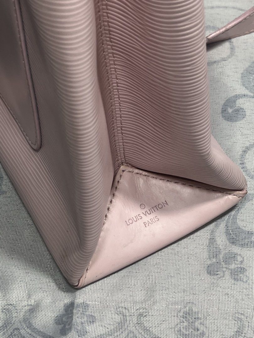 Louis Vuitton Epi Leather Pink Top Handle Bag (Category: Luxury Bags & Wallets) located in General Santos City (Dadiangas). Submitted by maisonmargiela2004 (Listing ID 1461988618, Image 2). Description: - Authentic Pink Louis Vuitton Bag - Epi Leather Texture - Detachable Shoulder Strap Included - Black Top Handles - Interior Zipper Pocket - Silver-Toned Hardware - Made in France - Clean Inside and Out.