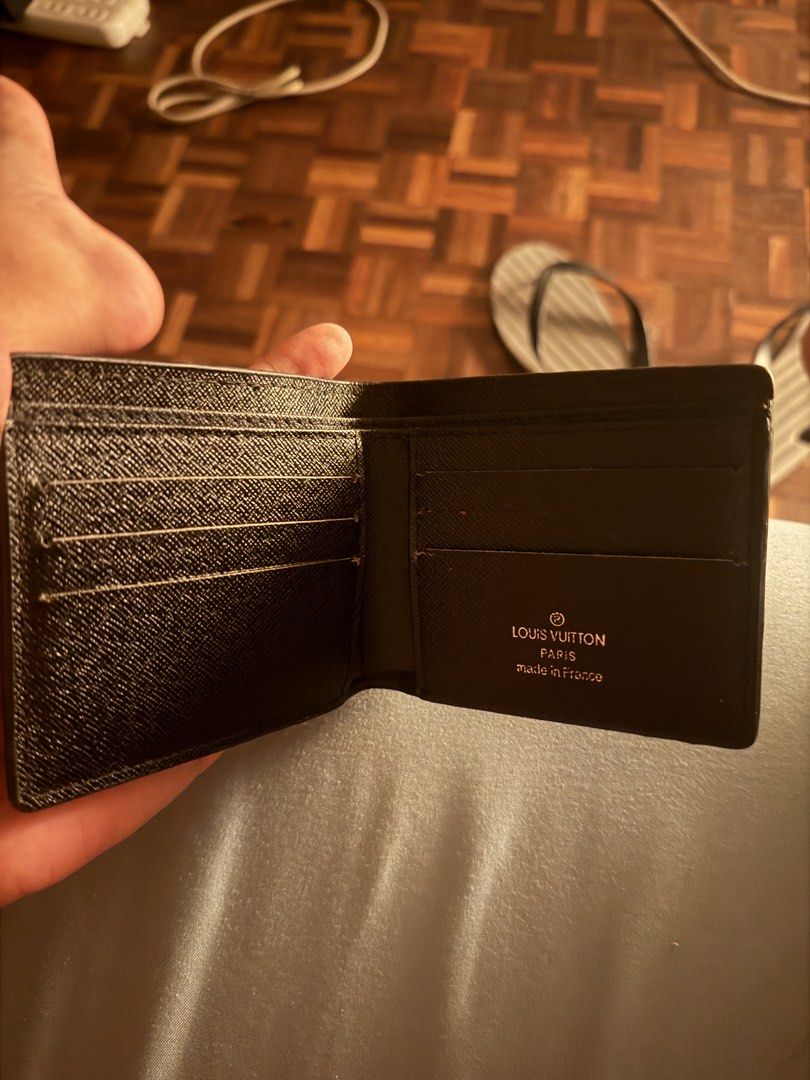 Louis Vuitton Monogram Bifold Wallet (Category: Luxury Bags & Wallets) located in Manila. Submitted by caballeroa11402 (Listing ID 1461977539, Image 3). Description: - Authentic Louis Vuitton bifold wallet - Classic monogram pattern - Multiple card slots - Bill compartment - Made in France - Timeless essential.
