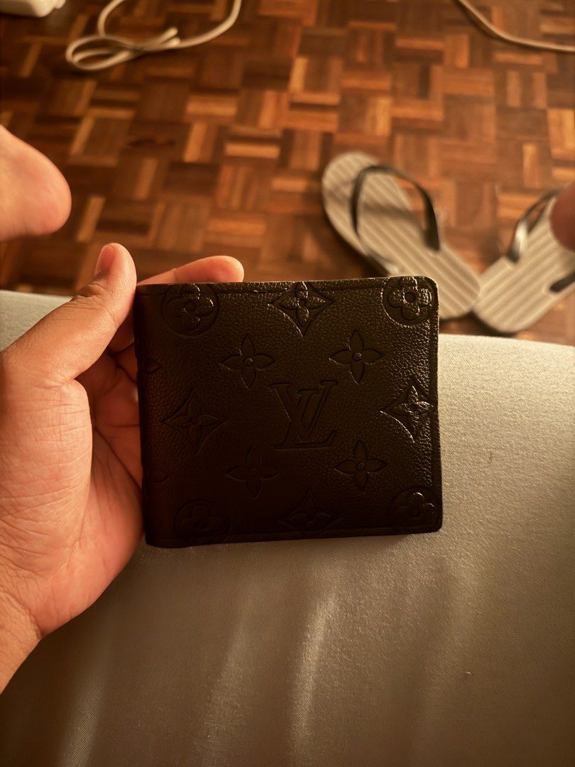 Louis Vuitton Monogram Bifold Wallet (Category: Luxury Bags & Wallets) located in Manila. Submitted by caballeroa11402 (Listing ID 1461977539, Image 2). Description: - Authentic Louis Vuitton bifold wallet - Classic monogram pattern - Multiple card slots - Bill compartment - Made in France - Timeless essential.