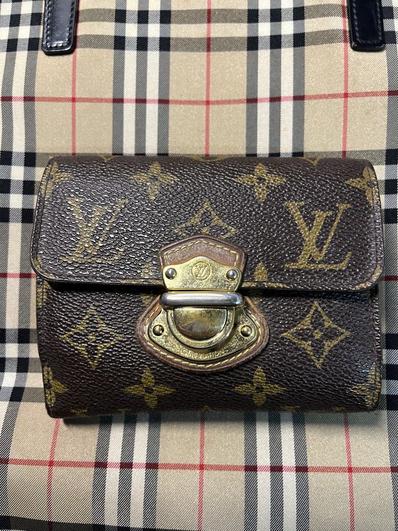 Louis Vuitton Monogram Canvas Bifold Wallet (Category: Luxury Bags & Wallets) located in Cainta. Submitted by eyecandy02 (Listing ID 1461997287, Image 1). Description: - Authentic Louis Vuitton wallet - Classic monogram canvas - Bifold design - Multiple card slots - Zippered coin pocket - Gold-tone hardware - Shows some signs of wear (clasp, edges) consistent with regular use - Functional and stylish piece.