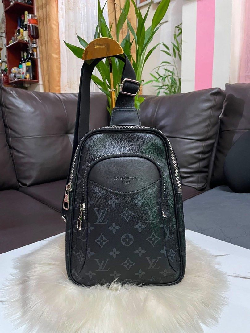 Louis Vuitton Monogram Sling Bag(Unisex) (Category: Luxury Bags & Wallets) located in Cebu City. Submitted by ludz_0246_2.0 (Listing ID 1461940812, Image 1). Description: - Louis Vuitton sling bag - Black monogram canvas with leather trim - Adjustable strap for comfortable wear - Multiple zippered compartments for organization - Made in France - Ideal for everyday use -Dustbag with Code .