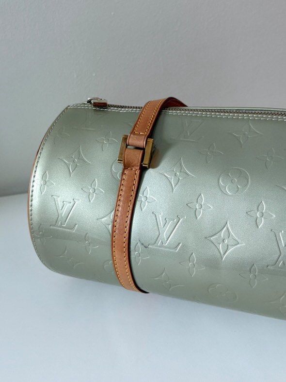 Louis Vuitton Monogram Vernis Papillon Bag (Category: Luxury Bags & Wallets) located in Tacloban City. Submitted by nikowlreads (Listing ID 1461963097, Image 2). Description: - Authentic Louis Vuitton Papillon bag - Monogram Vernis in a unique pale green color - Smaller size, ideal for essentials - Features leather trim and handles - Secure zipper closure.