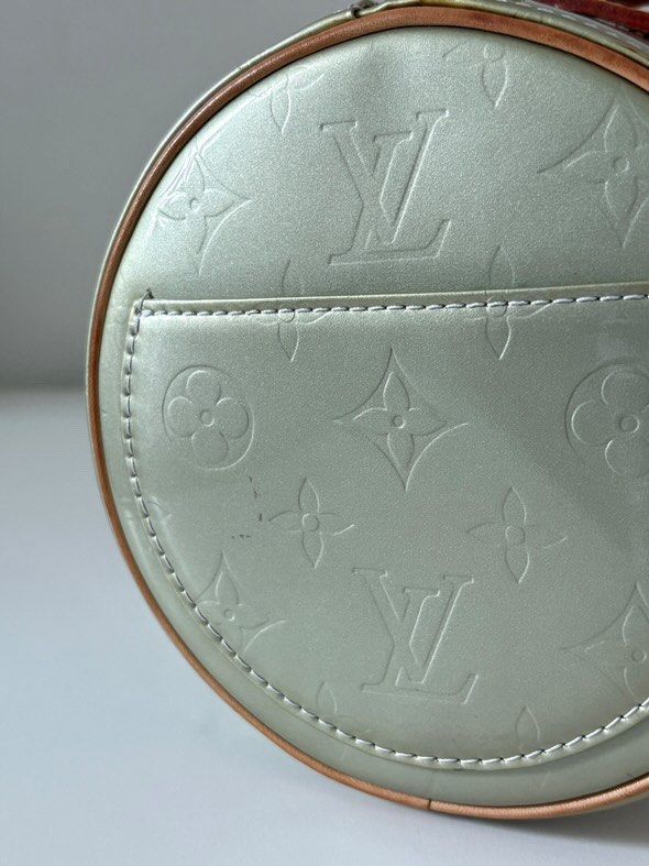Louis Vuitton Monogram Vernis Papillon Bag (Category: Luxury Bags & Wallets) located in Tacloban City. Submitted by nikowlreads (Listing ID 1461963097, Image 3). Description: - Authentic Louis Vuitton Papillon bag - Monogram Vernis in a unique pale green color - Smaller size, ideal for essentials - Features leather trim and handles - Secure zipper closure.