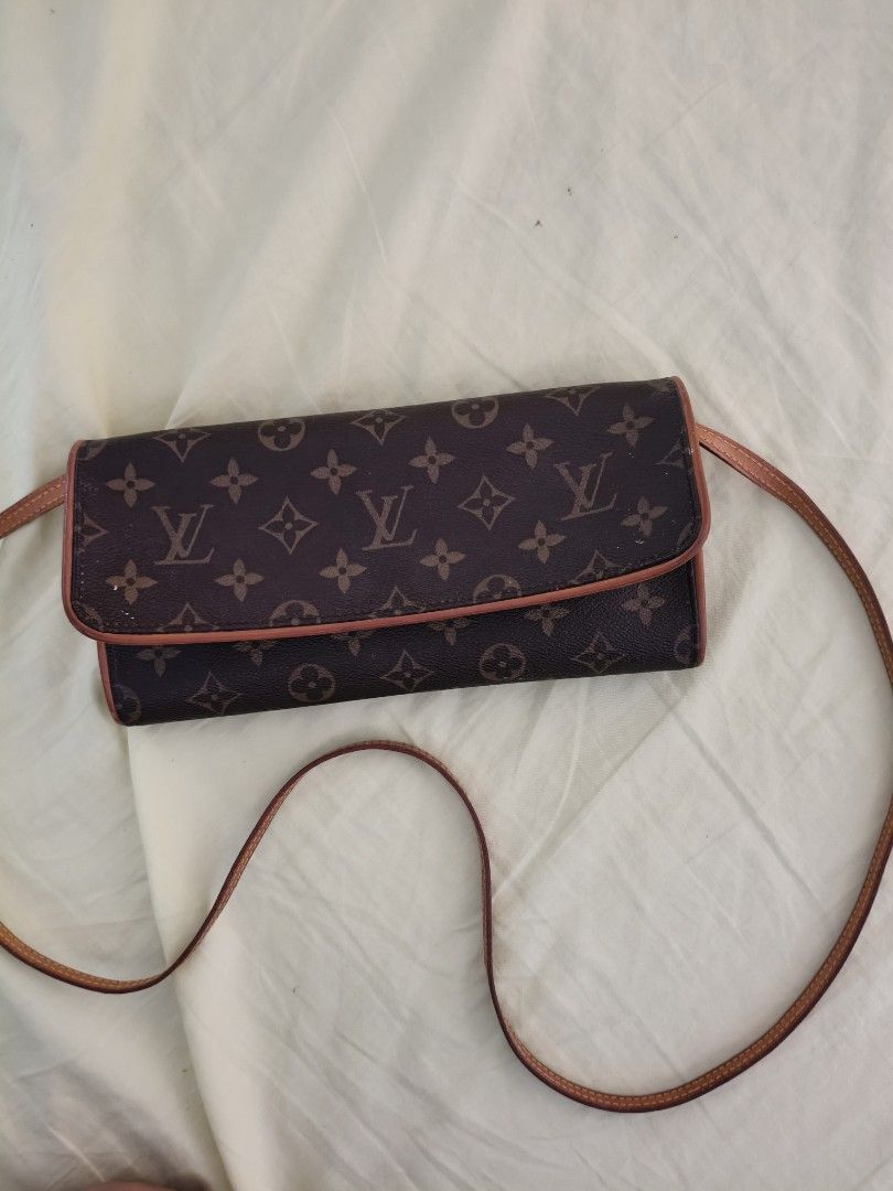 Louis Vuitton Monogram Wallet on Chain (Category: Luxury Bags & Wallets) located in Bulacan. Submitted by aichang21 (Listing ID 1461847251, Image 1). Description: - Classic Louis Vuitton Monogram Wallet on Chain - Genuine leather trim and strap - Secure snap closure - Elegant gold-tone hardware - Spacious interior for cards and essentials - Versatile for everyday wear or special occasions.