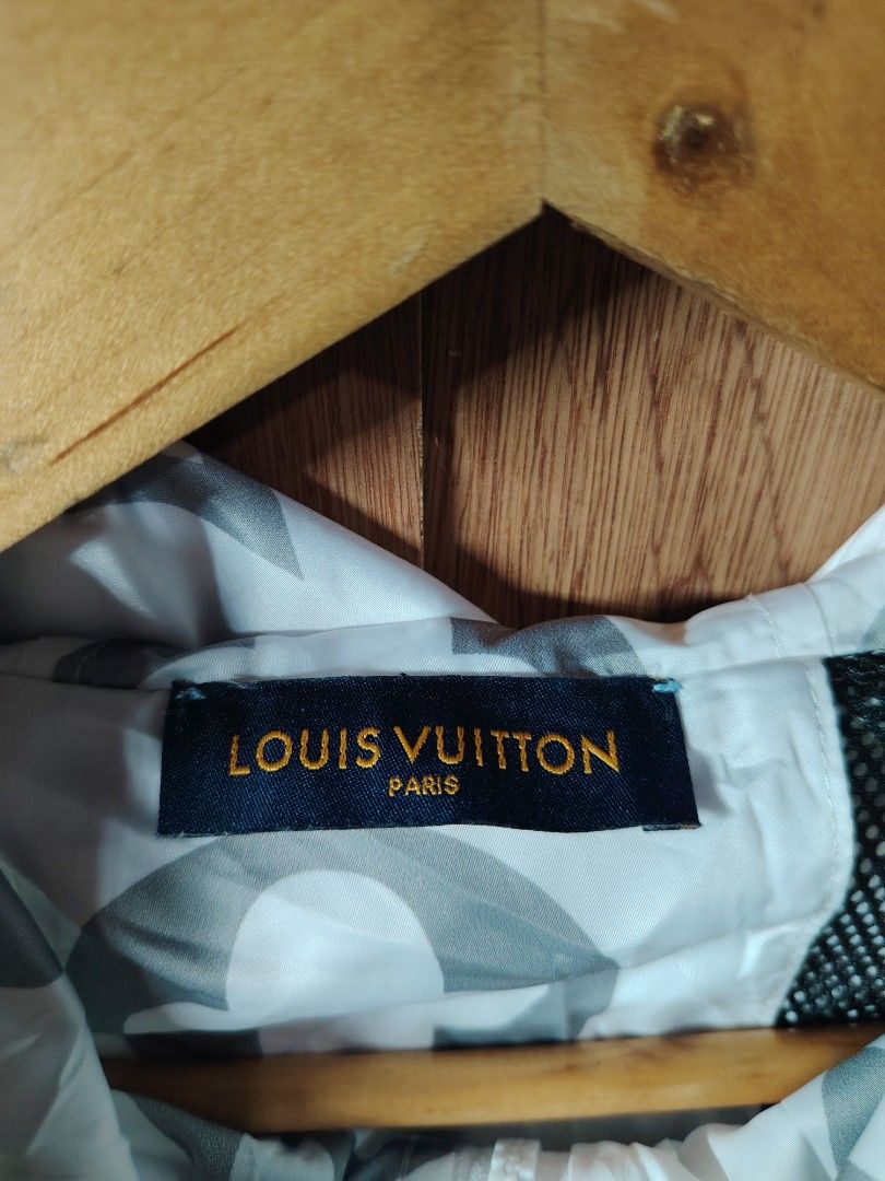 Louis Vuitton Monogram Windbreaker Jacket (Category: Coats, Jackets and Outerwear) located in Baguio. Submitted by angeloshoppebaguio2600 (Listing ID 1461984502, Image 2). Description: - Lightweight Louis Vuitton windbreaker - Iconic grey and white monogram pattern - Zip-up front with a hood - Adjustable drawstrings at hood and waist - Made in Italy - Size meduim .