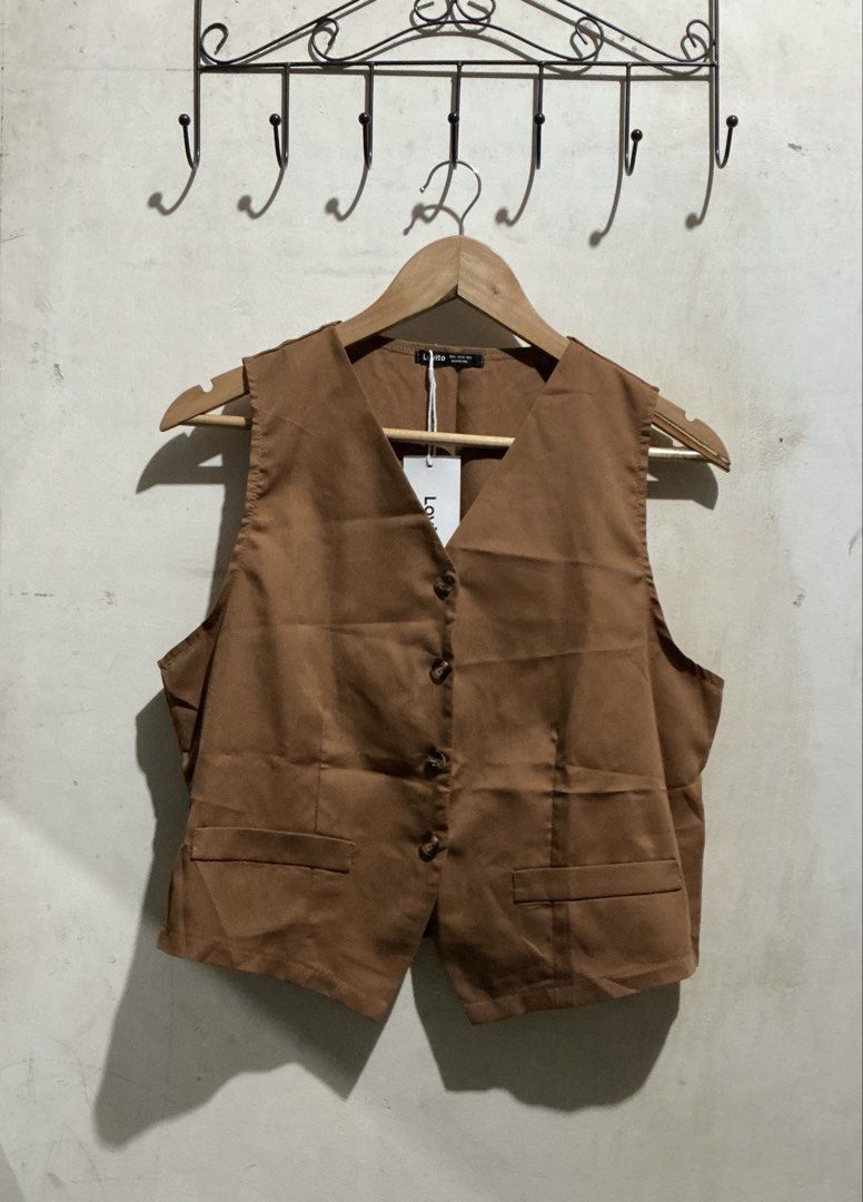 LOVITO BROWN VEST TOP (Category: Others Tops) located in Dagupan City. Submitted by trendies_collection (Listing ID 1462015789, Image 2). Description: Brand new with pouch and hang tag Large on tag, fits medium to large No issue.