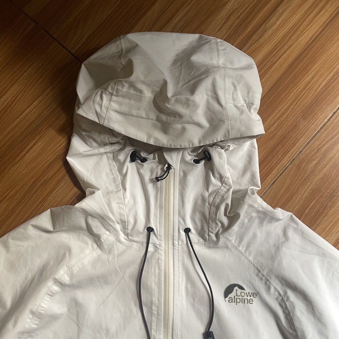 Lowe Alpine Hooded Rain Jacket - Unisex (Category: Coats, Jackets and Outerwear) located in General Mariano Alvarez. Submitted by 4117_thriftnthrive (Listing ID 1462000272, Image 3). Description: Fair condition Stain, nag babakbak yung loob Size on tag: L Measurements Width: 20” Length: 25”.