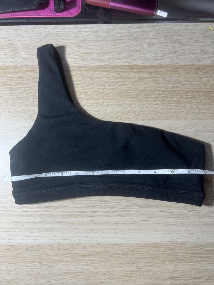 LSKD Black One Shoulder Sports Bra (Category: Activewear) located in Taguig. Submitted by strutstella (Listing ID 1461892936, Image 3). Description: - LSKD black one-shoulder sports bra - Provides good support for workouts - Features an elasticated band at the bottom - Band measures approx. 12 inches across when laid flat - Perfect for gym sessions or casual wear Size is small, can fit 34 bust but tight so it’s best for 32.