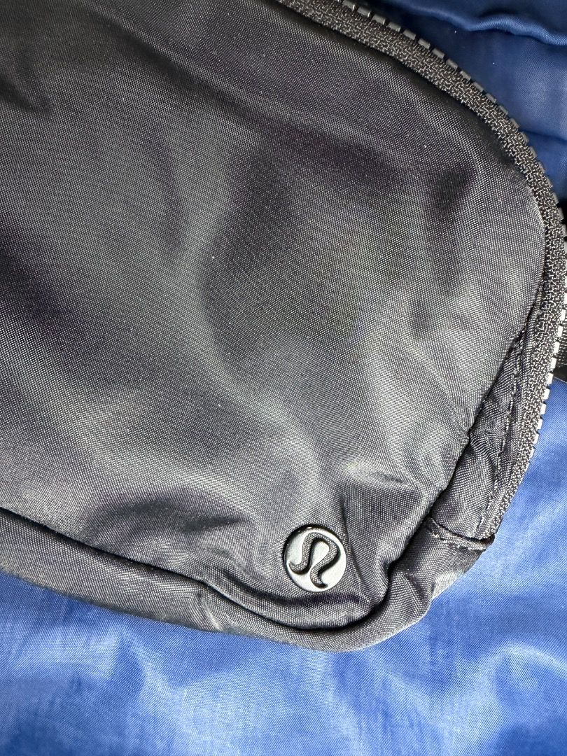 Lululemon - Belt Bag Black (Category: Cross-body Bags) located in Las Pinas. Submitted by nproducts (Listing ID 1461936788, Image 2). Description: Type: Sling Bag / Belt Bag Color: Black (Adjustable body strap) Bought from: Lululemon Store - Toronto, Canada Classification: 100% Original item Condition: Good as new, used several times only Reason for selling: Not using it anymore (Decluttering) Selling Price: P 3,000.00 (Negotiable) - Classic Lulu