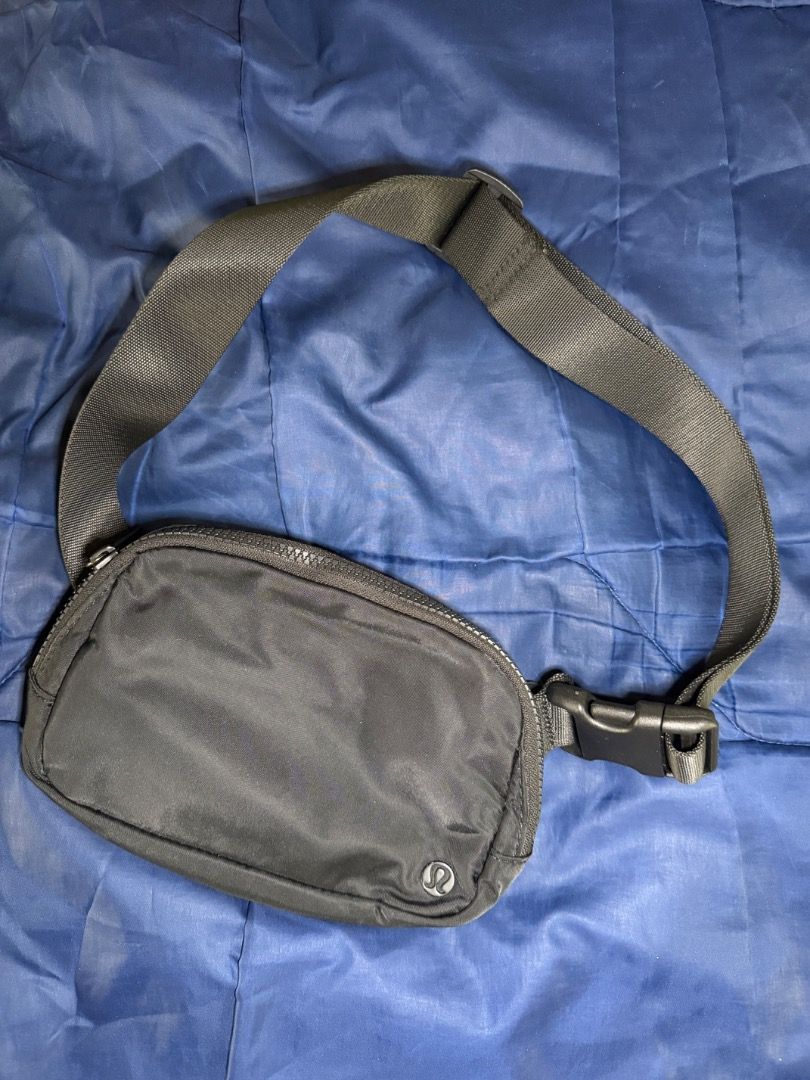 Lululemon - Belt Bag Black (Category: Cross-body Bags) located in Las Pinas. Submitted by nproducts (Listing ID 1461936788, Image 1). Description: Type: Sling Bag / Belt Bag Color: Black (Adjustable body strap) Bought from: Lululemon Store - Toronto, Canada Classification: 100% Original item Condition: Good as new, used several times only Reason for selling: Not using it anymore (Decluttering) Selling Price: P 3,000.00 (Negotiable) - Classic Lulu