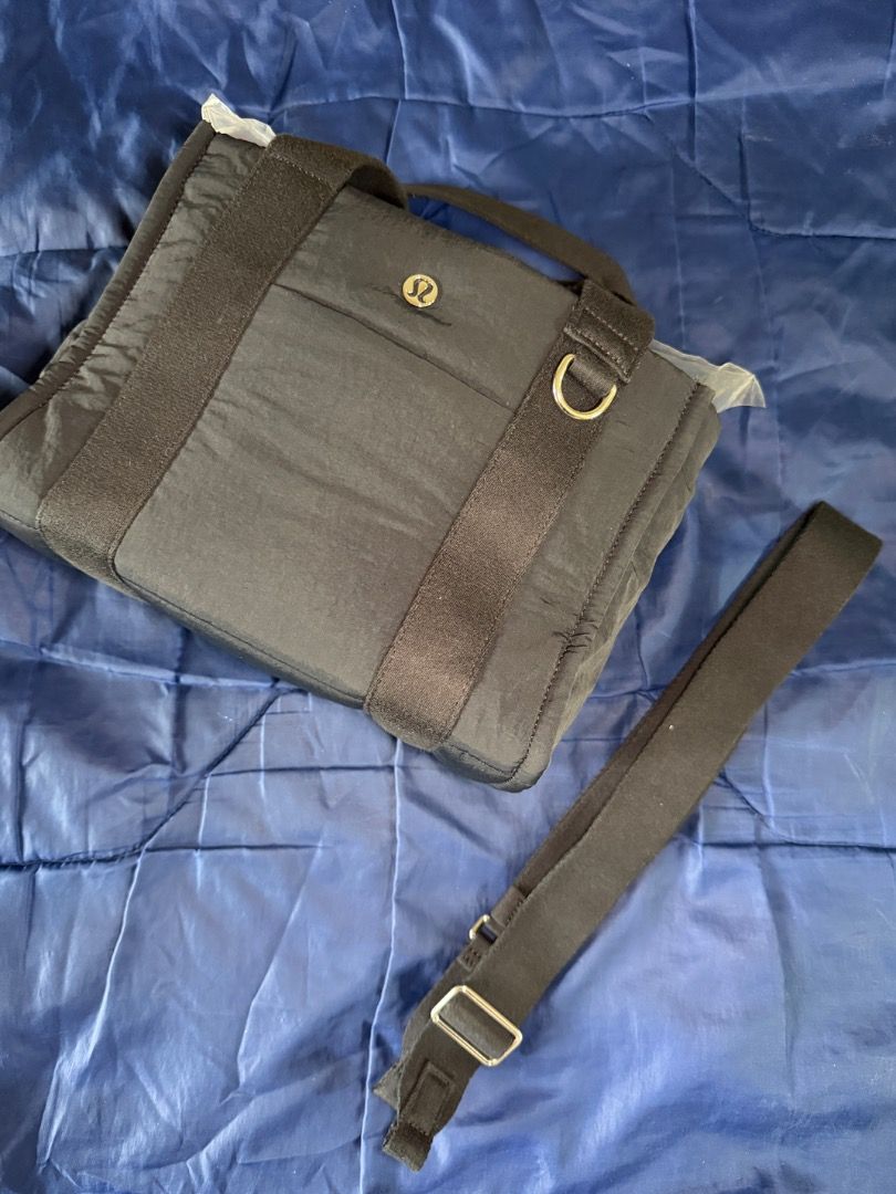 Lululemon Black Nylon Tote Bag with Strap (Category: Tote Bags) located in Las Pinas. Submitted by nproducts (Listing ID 1461935263, Image 1). Description: Type: Tote Bag Color: Black (Detachable Body body strap) Bought from: Lululemon Store - Toronto, Canada Classification: 100% Original item Condition: Good as new, used several times Reason for selling: Not using it anymore (Decluttering) Selling Price: P 6,000.00 (Negotiable) - Stylish black L