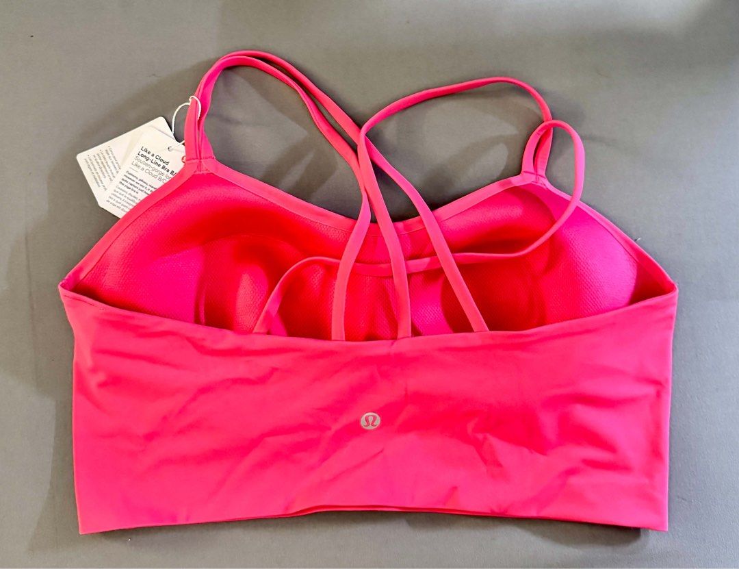 Lululemon Like a Cloud Longline Bra B/C Size 12 (Category: Activewear) located in Pasig City. Submitted by geezmeez (Listing ID 1461977681, Image 2). Description: - Brand: Lululemon - Style: Like a Cloud Longline Bra - Color: Bright Pink - Size: 12 (fits B/C cup) - Features: Strappy back design - Ideal for: Workouts, everyday wear - Benefits: Comfortable and supportive.