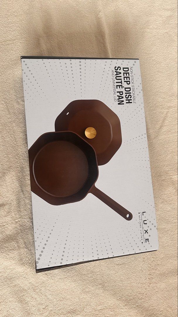 LUXE Deep Dish Sauté Pan Non-Stick Stackable with Lid (Category: Cookware & Accessories) located in Balete No 2. Submitted by rynsells_ (Listing ID 1461851611, Image 3). Description: - LUXE deep dish sauté pan - Non-stick surface for easy cooking and cleaning - Stackable design for convenient storage - Includes a matching lid with a stylish gold knob - Elegant deep brown color - Versatile for various dishes - Original box included - Size: 26cm 📍