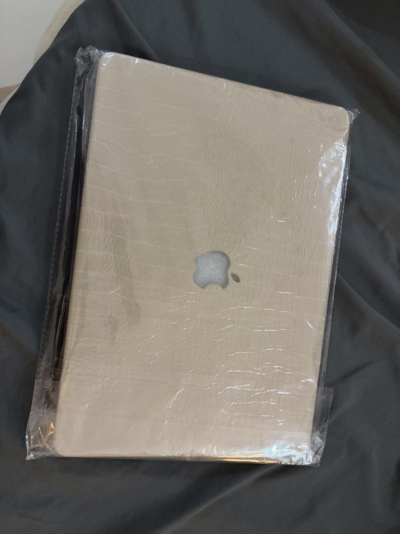 Macbook 15inch Crocodile Case (Category: Laptop Bags & Sleeves) located in Marilao. Submitted by itsjanella.07 (Listing ID 1461824081, Image 1). Description: RFS: wrong size for my laptop. Condition: Brand New Description: Crocodile Textured Case.