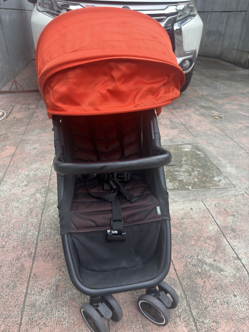 Mamas & Papas Acro Cabin size approved (Category: Strollers) located in Pasig City. Submitted by clairelopez0213 (Listing ID 1461845033, Image 1). Description: - Mamas & Papas stroller in orange with a black frame. - Features a stylish patterned seat. - Equipped with a secure 5-point harness. - Includes a convenient storage basket underneath. - Adjustable canopy for sun protection. - Folds compactly for easy storage and travel. - Ideal for everyd