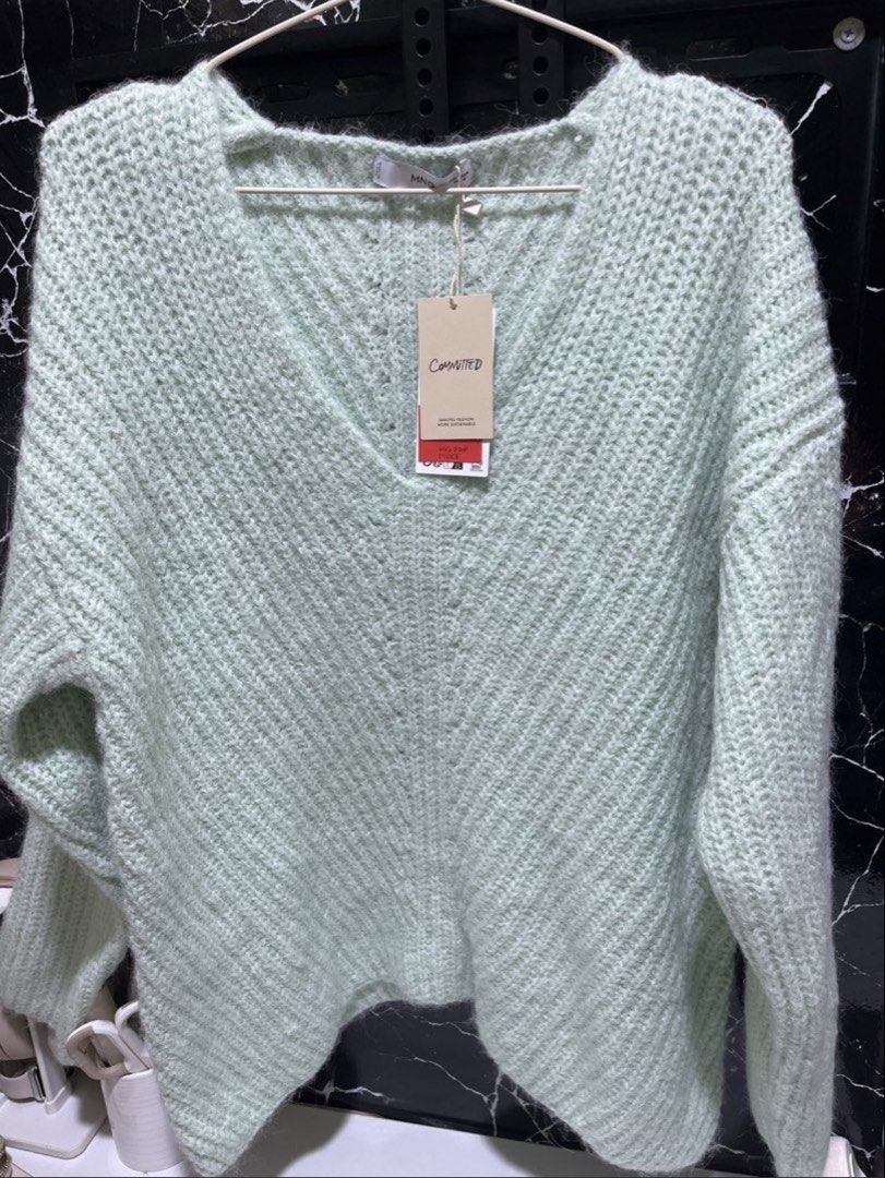 Mango Committed V-Neck Knit Sweater (Category: Coats, Jackets and Outerwear) located in Manila. Submitted by camron08 (Listing ID 1461851003, Image 1). Description: - Light green knit sweater from Mango - V-neck style with a relaxed fit - Made with recycled materials (Committed collection) - Soft and cozy feel - Ideal for layering or wearing solo - Original price: 895 PHP.