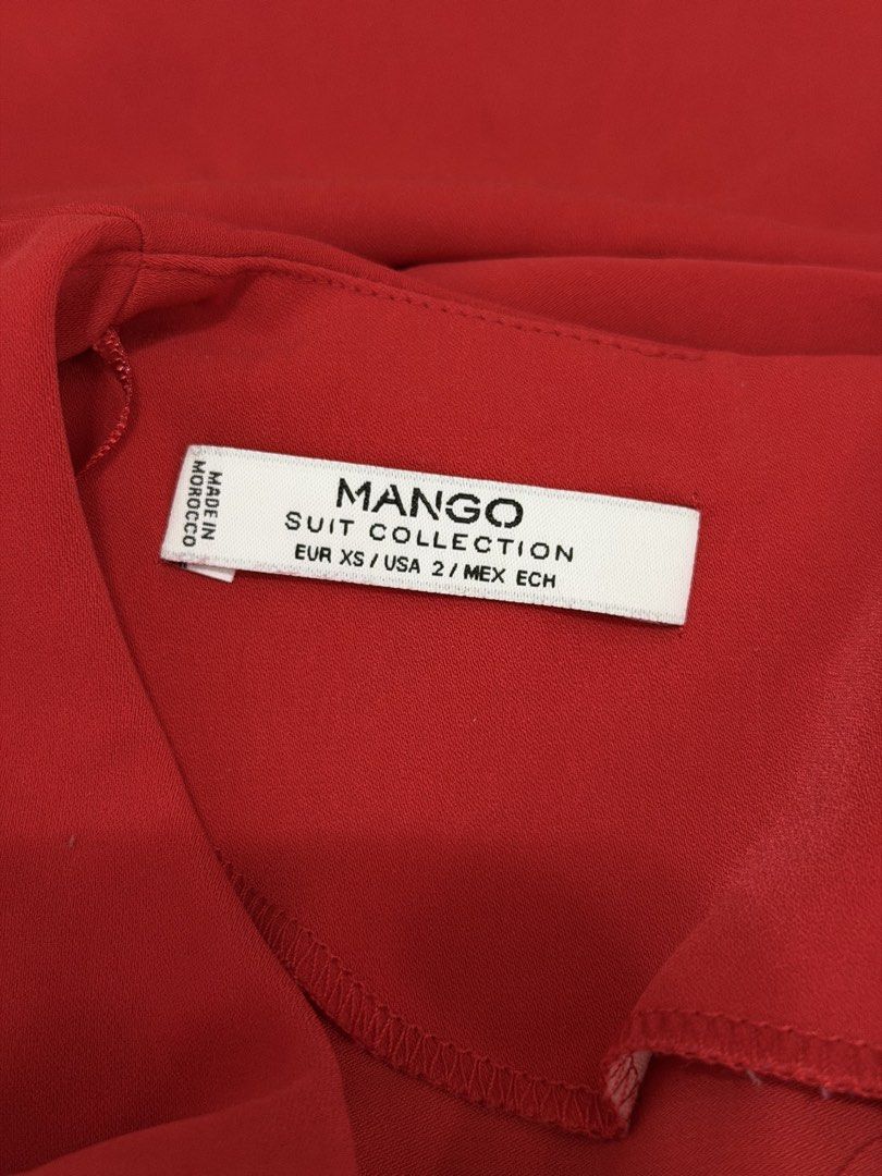 Mango Red Suit Collection Dress (Category: Dresses) located in Malolos. Submitted by eadiana (Listing ID 1461996000, Image 3). Description: - Mango red dress from the Suit Collection. - Short sleeves with a flattering peplum hem. - Front zipper closure with stylish black trim detail. - Made in Morocco. - Size: EUR XS.