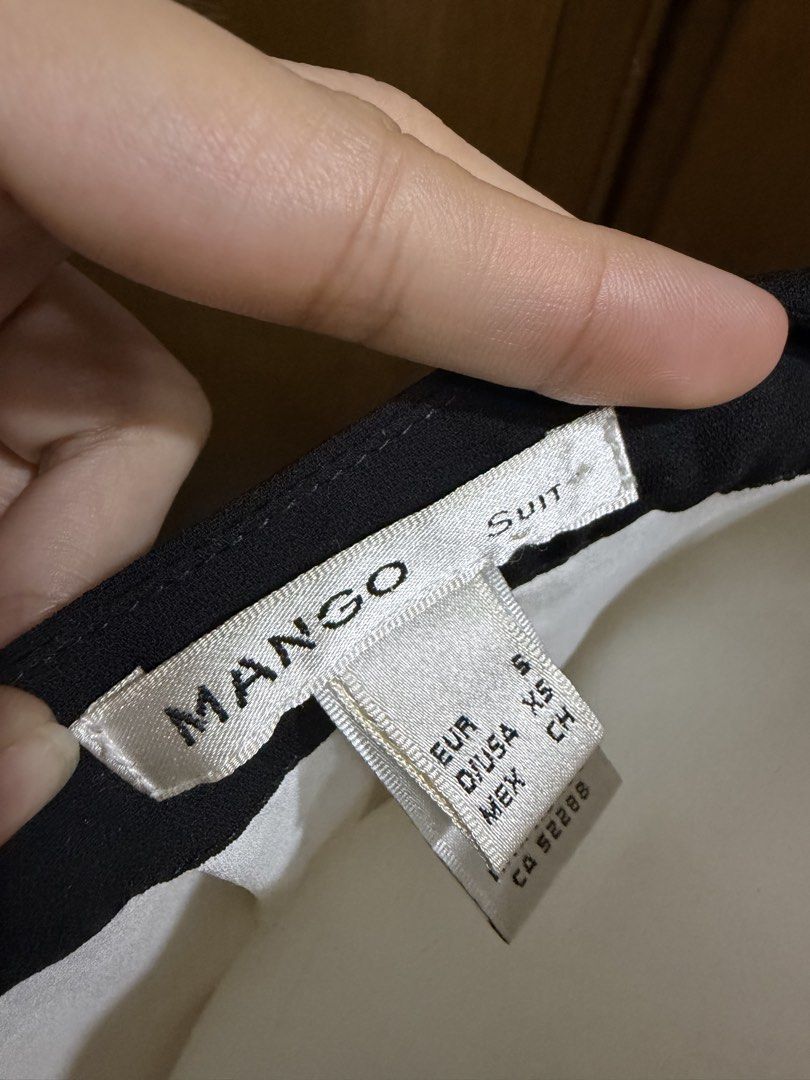 Mango Suit Top (Category: Blouses) located in Del Monte. Submitted by kbshoppingaccount (Listing ID 1461828311, Image 2). Description: Worn few times only at work!! Really good, especially the contrast of black and white ✨ .