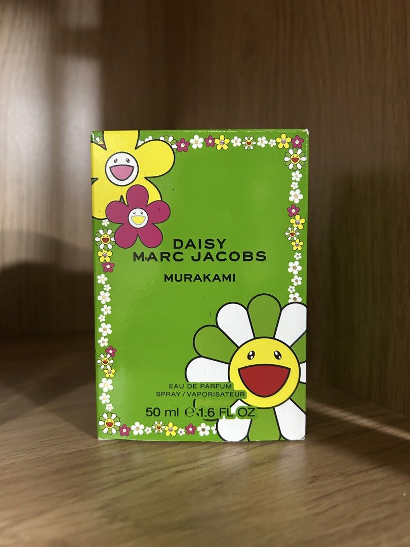 Marc Jacobs Daisy Murakami Eau de Parfum 50ml (Category: Fragrance & Deodorants) located in Manila. Submitted by qqmbr (Listing ID 1461897529, Image 1). Description: - Authentic Marc Jacobs Daisy Murakami Eau de Parfum - 50ml spray bottle - Features iconic Murakami flower design on green packaging - Limited edition, ideal for collectors and fragrance enthusiasts - A unique and sought-after scent - Retail price: ₱6,898.
