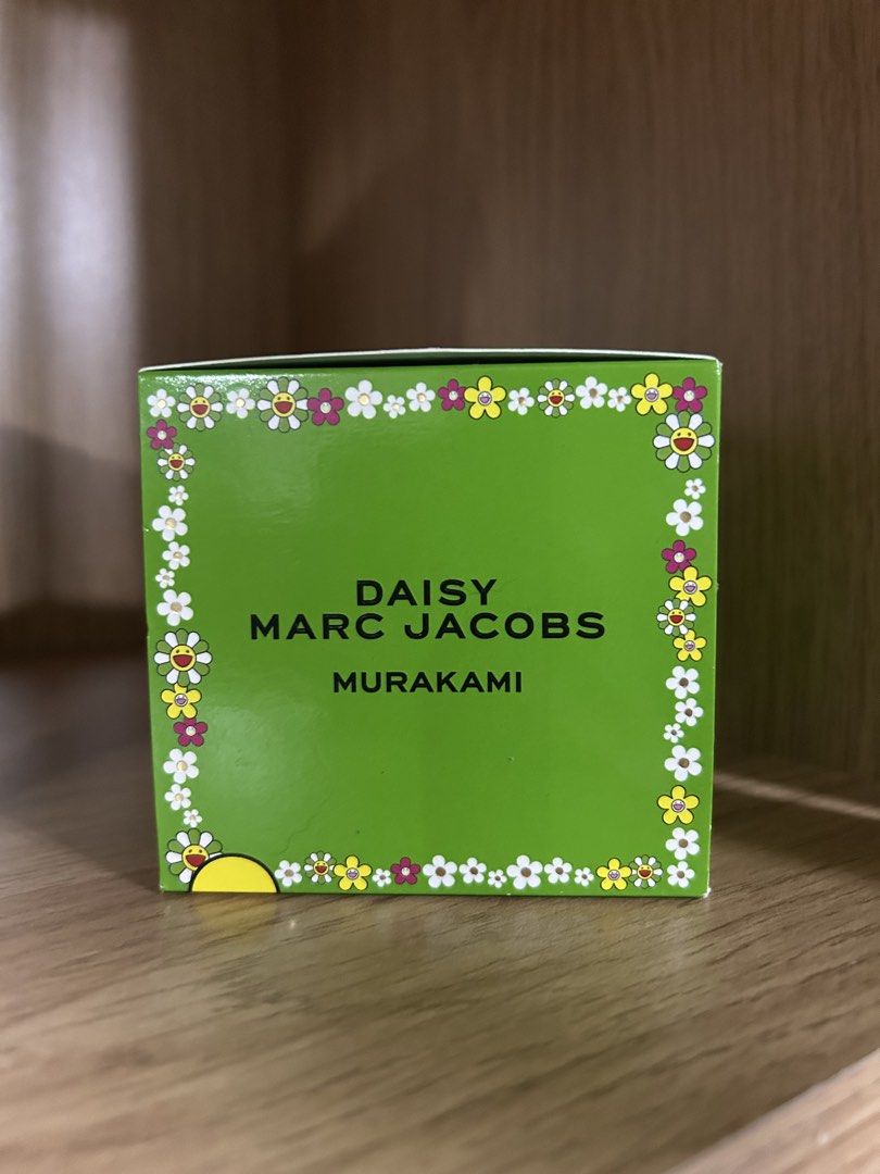 Marc Jacobs Daisy Murakami Eau de Parfum 50ml (Category: Fragrance & Deodorants) located in Manila. Submitted by qqmbr (Listing ID 1461897529, Image 3). Description: - Authentic Marc Jacobs Daisy Murakami Eau de Parfum - 50ml spray bottle - Features iconic Murakami flower design on green packaging - Limited edition, ideal for collectors and fragrance enthusiasts - A unique and sought-after scent - Retail price: ₱6,898.