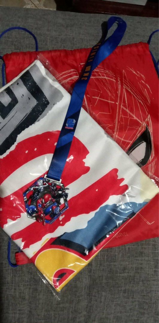 Marvel Spider-Man 3K Run Medal, Towel & Drawstring Bag (Category: Western Merchandise) located in Malabon City. Submitted by wilbert.te (Listing ID 1461961163, Image 1). Description: - Score this awesome Spider-Man 3K Run bundle! - Features a cool medal with multiple Spider-Man characters. - Includes a vibrant red, white, and blue towel showcasing Spidey's mask. - Comes with a matching red drawstring bag, also with a Spidey theme. - All items are