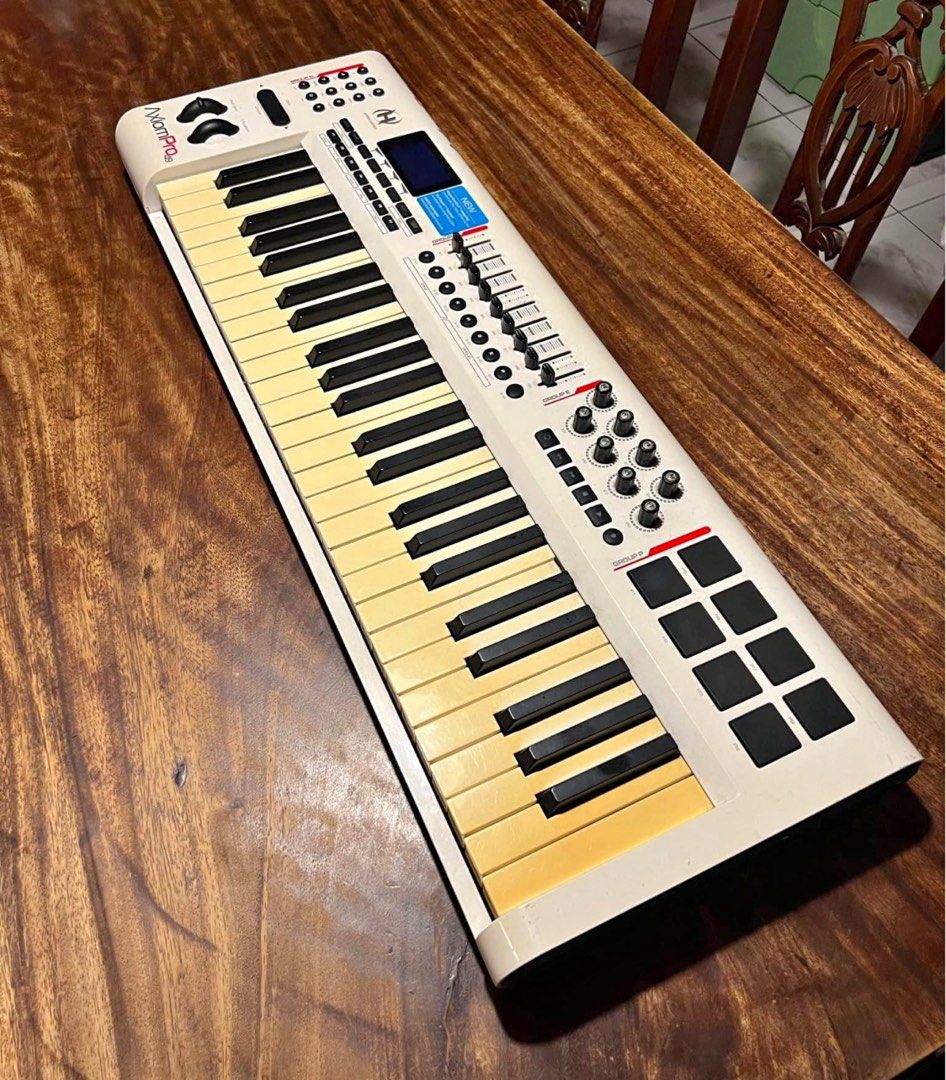 M-Audio Axiom Pro 49 MIDI Keyboard Controller (Category: Musical Instruments) located in Muntinlupa City. Submitted by shoesatbp (Listing ID 1461857394, Image 1). Description: - M-Audio Axiom Pro 49 - 49-key MIDI keyboard controller - Features numerous knobs, faders, and pads for music production - Ideal for studio setups, composing, and live performance - Sold as is Issue : yellowish keys.
