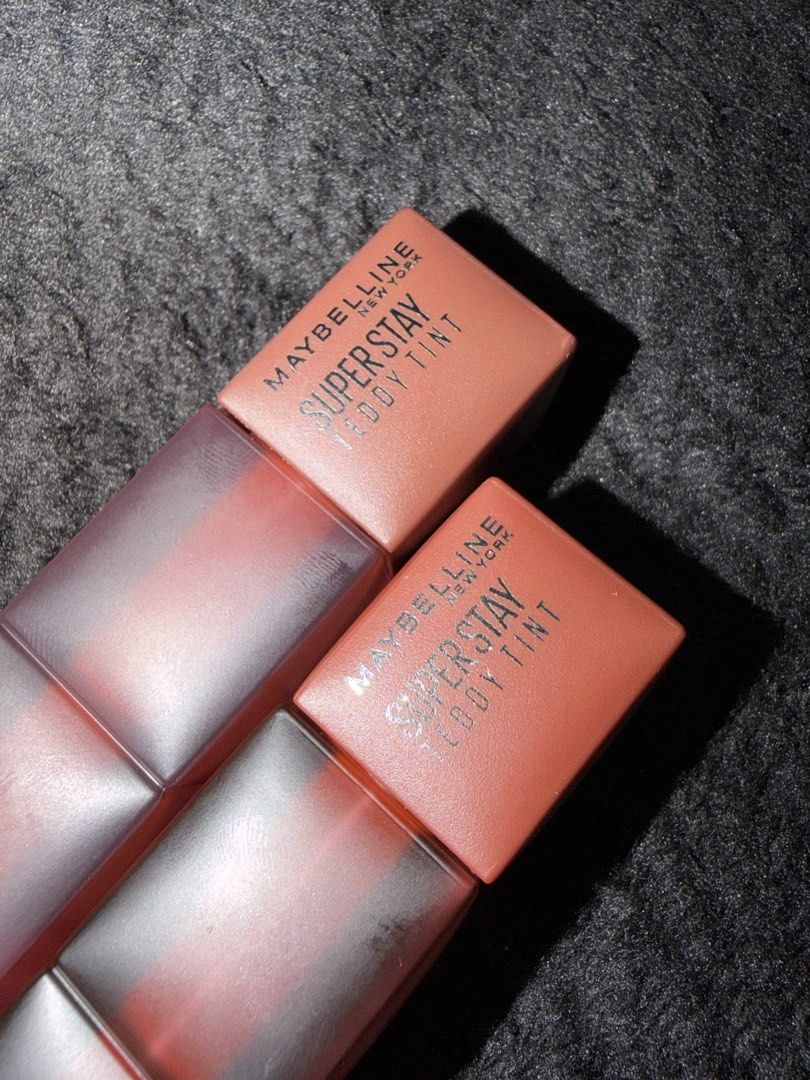 Maybelline Teddy Tint (Category: Makeup) located in Paranaque City. Submitted by chixnuggetz (Listing ID 1461972038, Image 2). Description: Used once Shades: Mascara Tear & 115 Coffee Date Long Lasting Swatches: Upper (coffee date) Lower (mascara tear).