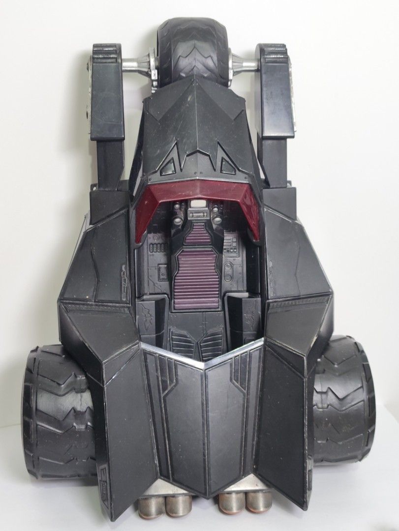 Mcfarlane Black Batmobile Toy Vehicle (Category: Vehicle & Diecast Models) located in Abucay. Submitted by lxtoyverse (Listing ID 1461828708, Image 1). Description: - Cool black toy vehicle, resembling the Batmobile. - Features large wheels for action-packed play. - Detailed cockpit area adds to the realism. - Shows minor scuffs from previous adventures. - Ideal gift for any Batman enthusiast. - Ready for new missions and imaginative play!.