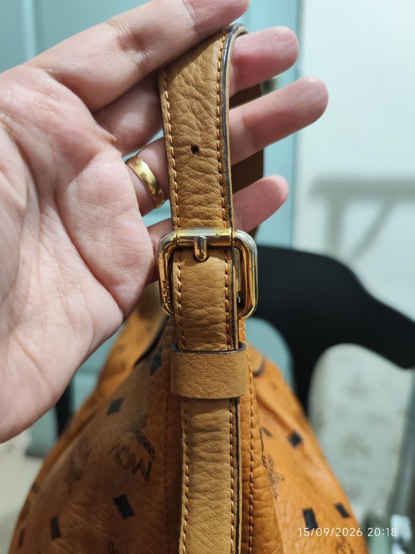 MCM Cognac Monogram Shoulder Bag Hobo Bag (Category: Luxury Bags & Wallets) located in Cavite. Submitted by isodanna0811-97013 (Listing ID 1461940479, Image 3). Description: -Lowest price Guaranteed for this condition. -Pwede tumawad, pm lang po -Korea source -Original with white tag -universal dust bag only Bag Description: - Rank: AB -Classic MCM shoulder bag - Signature monogram print - Tan leather trim and strap - Gold-tone hardware - Zipper 