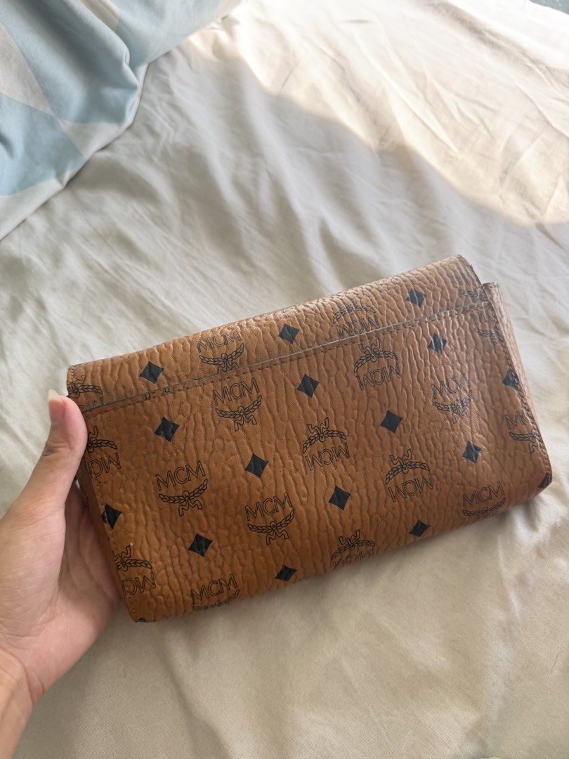 ‼️50% OFF‼️ MCM Two-way Bag (Category: Cross-body Bags) located in Manila. Submitted by xmagic.shopx (Listing ID 1461889419, Image 2). Description: With visible flaws but still working. Need Cleaning..