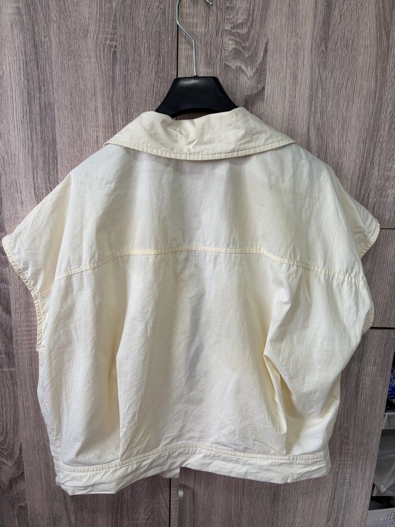 MEMO Cream Sleeveless Collared Button-Up Vest (Category: Sleeveless) located in Manila. Submitted by akingkingking (Listing ID 1461850106, Image 2). Description: - MEMO cream sleeveless vest - Collared neckline - Button-up front closure - Two chest pockets - Ideal for layering and easy styling - buyer to arrange and shoulder shipping fee.