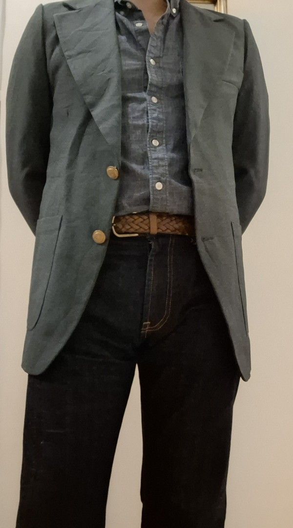 Mens Grey Vintage Blazer (Category: Coats, Jackets and Outerwear) located in Baguio. Submitted by give_fad15730 (Listing ID 1461891939, Image 2). Description: - PHP.450.00 -S:16in. -W:19in. -L:30in. -Arm:24.5in. -Vintage Dark grey tailored blazer - Two-button front closure - Gold-tone buttons on front and cuffs - Fully lined interior - Dry clean only - Ideal for smart casual or formal occasions.