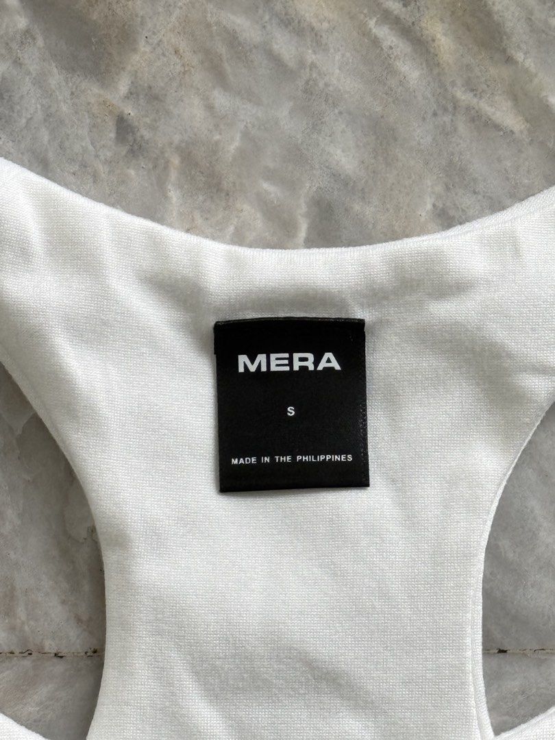 MERA Amanda Racerback Top (Category: Sleeveless) located in San Mateo. Submitted by aifoslvdr (Listing ID 1461831717, Image 2). Description: - White MERA tank top - Racerback style - Size S.